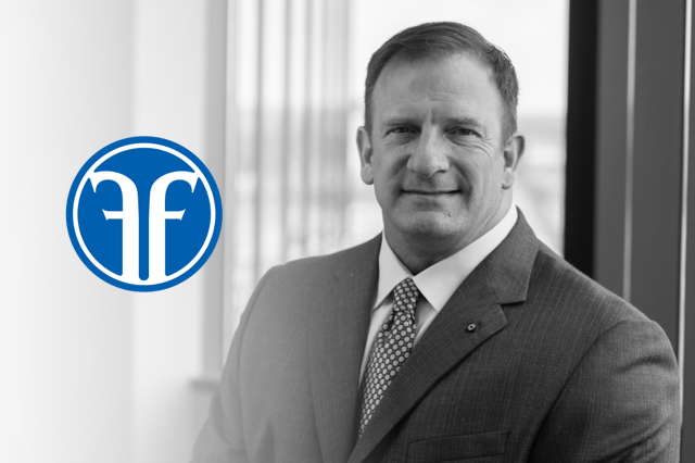 Michael Moellering with Foellinger Foundation logo