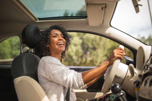 Women Driving Vehicle