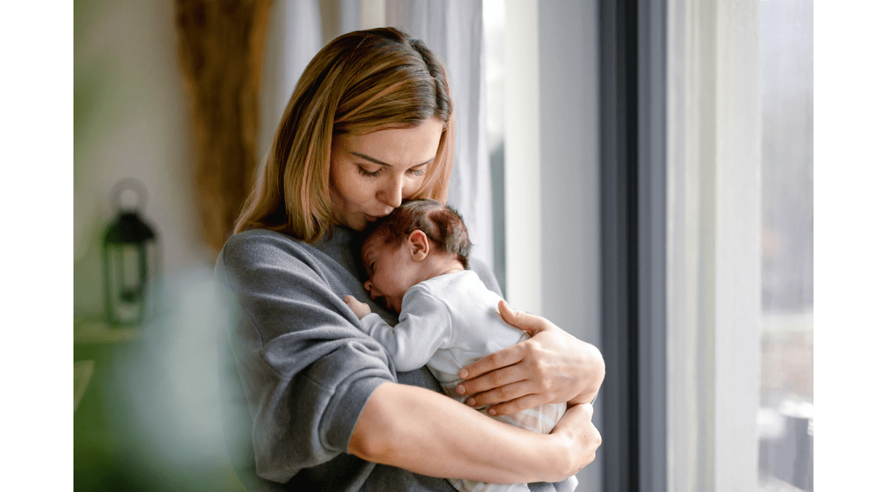 Mother Holding Her Baby Mother Holding Her Baby