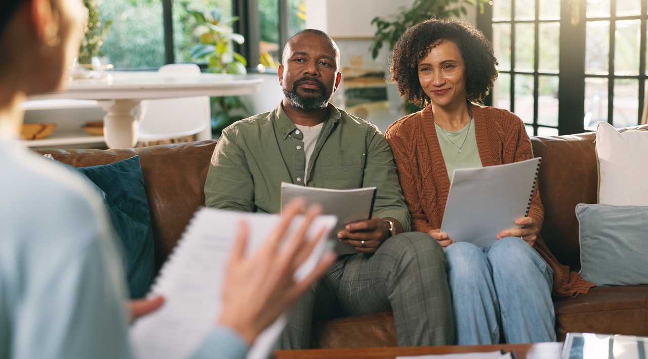 Couple Meeting with Lawyer over Estate Planning